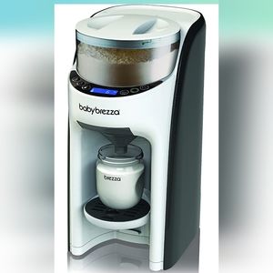 Baby Brezza Formula Pro with spare funnel set